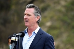 FILE - California Governor Gavin Newsom speaks during a press conference near Big Sur, Calif., April 23, 2021.