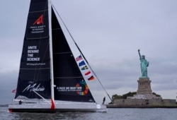Swedish climate activist Greta Thunberg sails into New York harbor aboard the Malizia II, a zero-emissions yacht, Aug. 28, 2019.