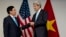 FILE - U.S. Secretary of State John Kerry, right, meets with Vietnam's Foreign Minister Pham Binh Minh during ASEAN meetings in Bandar Seri Begawan, Brunei on Tuesday, July 2, 2013. 