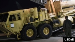 The first elements of a Terminal High Altitude Area Defense system (THAAD) to be installed in South Korea are unloaded from a U.S. military cargo plane, March 6, 2017.