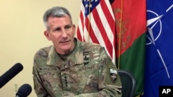 FILE - Gen. John Nicholson, the top American commander in Afghanistan, speaks to reporters at Bagram air base north of Kabul, Afghanistan, March 14, 2018.