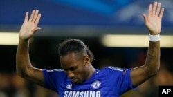 Didier Drogba après un but à Stamford Bridge à Londres, 21 octobre, 2014. (AP Photo/Kirsty Wigglesworth)