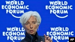 Managing Director of the International Monetary Fund, Christine Lagarde, speaks during a panel &quot;The Global Economic Outlook&quot; at the World Economic Forum in Davos, Switzerland, Jan. 23, 2016. 
