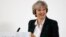 Britain's Prime Minister Theresa May smiles after she delivers a speech on leaving the European Union at Lancaster House in London, Jan. 17, 2017.