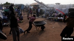 South Sudanese children displaced by the fighting are seen in a camp for displaced persons in the UNMISS compound in Tongping in Juba, South Sudan, Feb. 19, 2014.