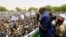 Sudanese President Omar Hassan al-Bashir addresses the crowd during a campaign rally in East Darfur, April 5, 2016.