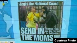 Screen grab from CBS News report on Toya Graham the Baltimore mom who pulled her son away from the rioting.