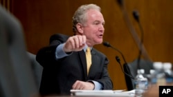 Sen. Chris Van Hollen, D-Maryland, questions EPA Administrator Scott Pruitt as he testifies before a Senate Appropriations subcommittee on Capitol Hill, May 16, 2018. 
