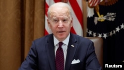 2022年1月20日，拜登总统在与基础设施建设特别工作组举行会议前就乌克兰局势向媒体发表讲话。（路透社）