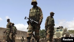 War veterans and commanding officers, who took part in a military parade held in celebration of the 60th anniversary of the signing of the truce of the Korean War, clap and cheer in an undisclosed location in this undated photo released by North Korea&#39;s Korean Central News Agency.