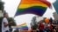 FILE - Participants attend the 5th annual LGBT pride parade in Hanoi, Vietnam, Aug. 21, 2016. East Timor, Asia's youngest nation, held its second LGBT pride parade July 20.