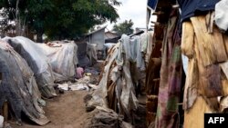 FILE - A view of a refugee camp situated in between a school and a Catholic church in Kiwanja, Rutshuru town, North Kivu on May 4, 2018. 