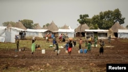 In this photo taken Oct. 24, 2017, South Sudanese refugees are seen at the Nguenyyiel refugee camp during a visit by U.S. Ambassador to the United Nations Nikki Haley to Gambella region, Ethiopia.