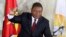 FILE - Mozambican President Felipe Nyusi poses at a polling station where he cast his vote in Maputo, Oct. 15, 2019. 