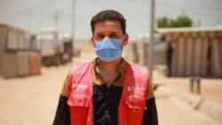 Sameeh, a Syrian refugee, serves as a community health volunteer for Save the Children, a UNHCR health partner in Za’atari Camp, Jordan. He has helped other refugees register for the COVID-19 vaccine. (© UNHCR/Yousef Alhariri)