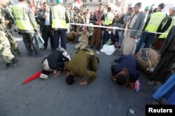 FILE - Houthi followers rally to celebrate the killing of Yemen's former president Ali Abdullah Saleh in Sana'a, Yemen, Dec. 5, 2017.