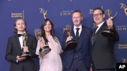 From left; Ronan Hill, Onnalee Blank, Richard Dyer, and Mathew Waters winners of the award for outstanding sound mixing for a comedy or drama series (one-hour) for "Game of Thrones - Beyond The Wall" pose in the press room during night one of the Creative Arts Emmy Awards at The Microsoft Theater on Saturday, Sept. 8, 2018, in Los Angeles.