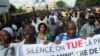 Malian journalists take to the streets of Bamako during a day of "Dead Press" to protest recent attacks against journalists by armed men believed to be linked to the former junta, July 17, 2012.