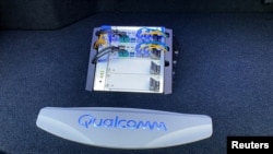 FILE - The new Snapdragon Ride autonomous driving computing system is seen in the trunk of a demo car at the Consumer Electronics Show (CES) in Las Vegas, Nevada, Jan. 5, 2020. 