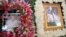 Portraits of Bernard Krisher, founder of The Cambodia Daily, are on display at his funeral ceremony in Phnom Penh, Cambodia, March 19, 2019. (Kann Vicheika/VOA Khmer)