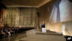 Sept 11 MuseumPresident Barack Obama speaks at the dedication ceremony for the National September 11 Memorial Museum on Thursday, May 15, 2014 in New York. (AP Photo/Mike Segar, Pool)