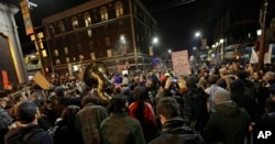 Protesters against a scheduled speaking appearance by Breitbart News editor Milo Yiannopoulos on the University of California at Berkeley campus march on Telegraph Avenue, Feb. 1, 2017, in Berkeley, Calif.