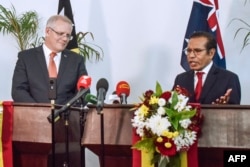 Perdana Menteri Timor Leste Taur Matan Ruak (kanan) dan Perdana Menteri Australia Scott Morrison (kanan) menghadiri konferensi pers bersama di Dili, 30 Agustus 2019. (Foto: AFP)