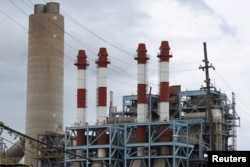 FILE - The power station Central San Juan of Puerto Rico Electric Power Authority (PREPA) is seen in San Juan, Puerto Rico, June 30, 2015.