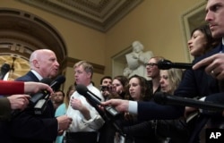 House Ways and Means Committee Chairman Kevin Brady, R-Texas., speaks to reporters on Capitol Hill in Washington, Dec. 15, 2017, on the progress of an agreement on a sweeping overhaul of the nation's tax laws.
