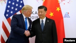 資料照：美國前總統、當選總統特朗普與中國領導人習近平在日本大阪出席G20峰會期間舉行會晤。（2019年6月29日）