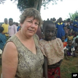 Diane Kroska visits a student in Gulu, Uganda.