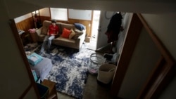 In this Thursday, March 19, 2020, photo, Jack Keenan, 16, plays video games at his home in San Francisco. California's Bay Area has been shut down for more than a week, the first region of America to order its residents to stay home and work remotely.