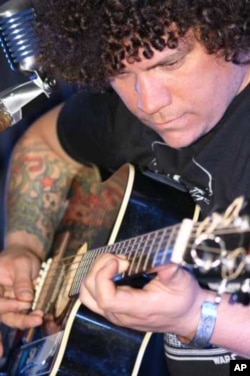 Once involved in death metal music, Engelbrecht is now writing songs using Spanish flamenco guitar