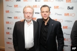 Director Ridley Scott and actor Matt Damon are seen at the Twentieth Century Fox 'The Martian' Premiere Gala at the 2015 Toronto International Film Festival, Sept. 11, 2015 in Toronto, Canada.