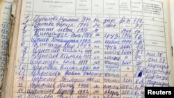 A school registry contains information on Boston bombing suspect Dzhokhar Tsarnaev (number 11 in the list) who studied at local school number one in Makhachkala, Apr. 19, 2013.