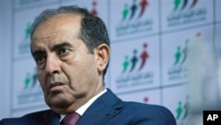Libyan politician Mahmoud Jibril talks to journalists in Tripoli Aug. 8, 2012.