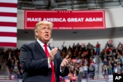 President Donald Trump arrives at a rally at Resch Center Complex in Green Bay, Wis., Saturday, April 27, 2019.