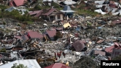 FILE - An aerial view of the destruction caused by an earthquake and liquefaction in the Petabo neighbourhood in Palu, Central Sulawesi, Indonesia, Oct. 7, 2018.