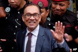 Malaysia's reformist icon Anwar Ibrahim arrives at his house in Kuala Lumpur, Malaysia, May 16, 2018.