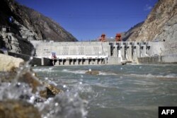 FILE - Picture shows the Zangmu Hydropower Station in Gyaca county in Lhoka, or Shannan prefecture, southwest China's Tibet region, Nov. 23, 2014.