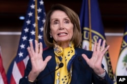 Speaker of the House Nancy Pelosi, D-Calif., talks to reporters on Capitol Hill, Jan. 24, 2019.