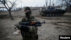 A Ukrainian serviceman is pictured at his position near Debaltseve, eastern Ukraine, February 8, 2015.