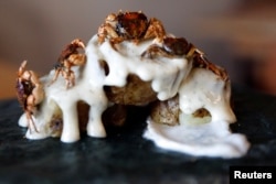 An invasive Asian crab roll is seen at Chef Bun Lai's Miya's Sushi restaurant in New Haven, Connecticut, Aug. 28, 2018.