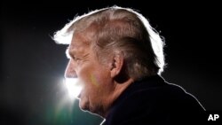 President Donald Trump speaks at a campaign rally at Duluth International Airport, Sept. 30, 2020, in Duluth, Minn.