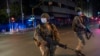 South African Defense Forces patrol downtown Johannesburg, South Africa, amid a nationwide coronavirus lockdown March 27, 2020.