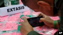 Zaplena psihodelične droge MDMA, poznate i kao ekstazi, u Kolumbiji, arhiva (AP Photo/Fernando Vergara)