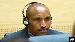 FILE - Bosco Ntaganda awaits the start of a hearing at the International Criminal Court (ICC) in The Hague, Netherlands.