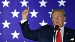 FILE - President Donald Trump speaks at a fundraiser in Fargo, N.D., Sept. 7, 2018. 