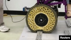 The "morphing" wheel can roll over obstacles up to 1.3 times the height of its radius. Inspired by the surface tension of water droplets, it goes from solid to fluid when it encounters impediments.