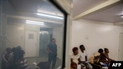 FILE - People wait to donate blood at a hospital in the Cite Soleil district of Port-au-Prince on Dec. 12, 2024. 